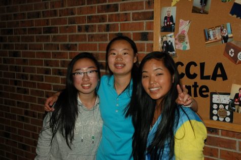 Cultural ARMS club members Amy Dong, Angel Dong, and Mira Eisele pose for a photo. 