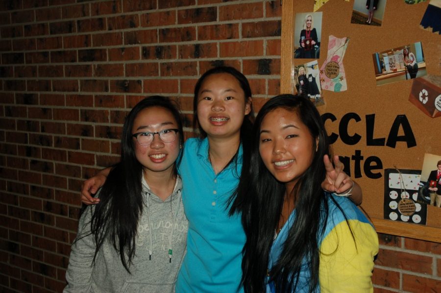 Cultural ARMS club members Amy Dong,  Angel Dong, and Mira Eisele pose for a photo. 