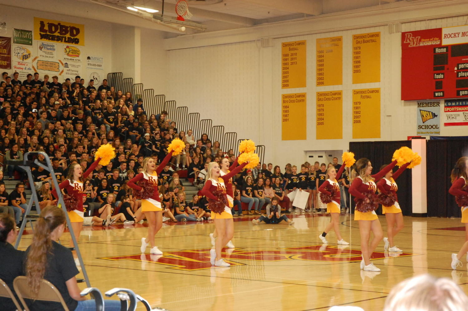 Cheerleaders performing at the back to schools assembly