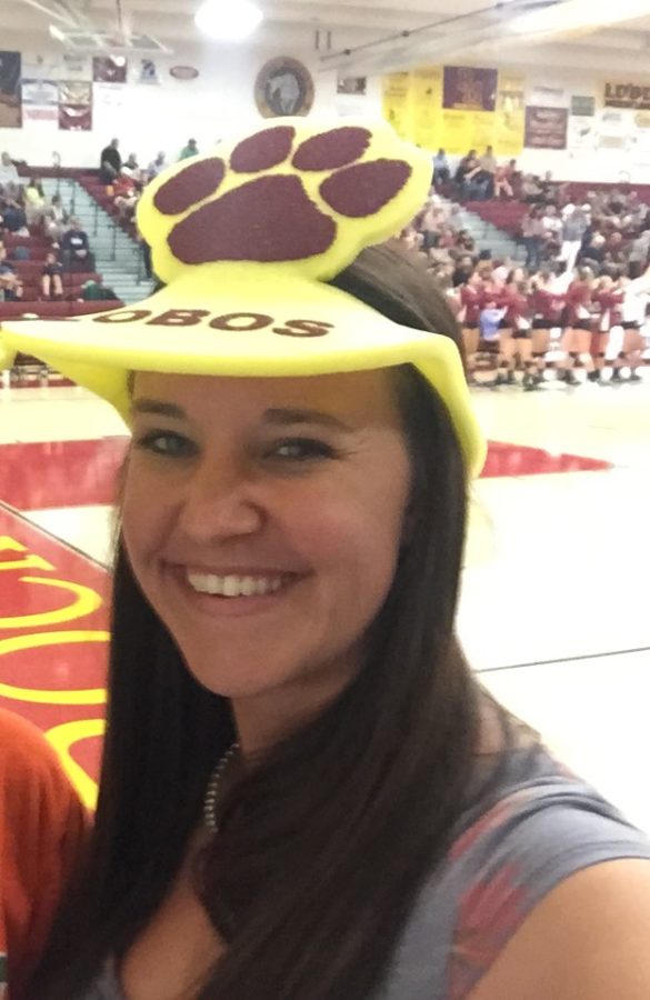 New StuCo advisor Ms. Kelsey Mauch cheers on the Bos at one of Rockys volleyball games, dressed in her Rocky gear.