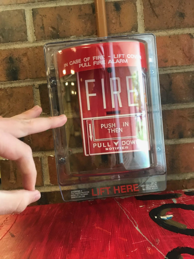 New boxes are being placed over fire alarms to prevent accidental pulls. 