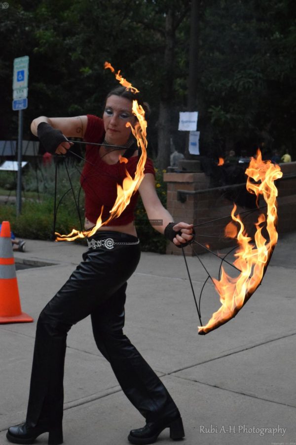 When dancing with fire, the clothing worn is all natural materials like cotton, wool, and leather because synthetic materials can cause possible burns to be much worse than with natural materials. 
