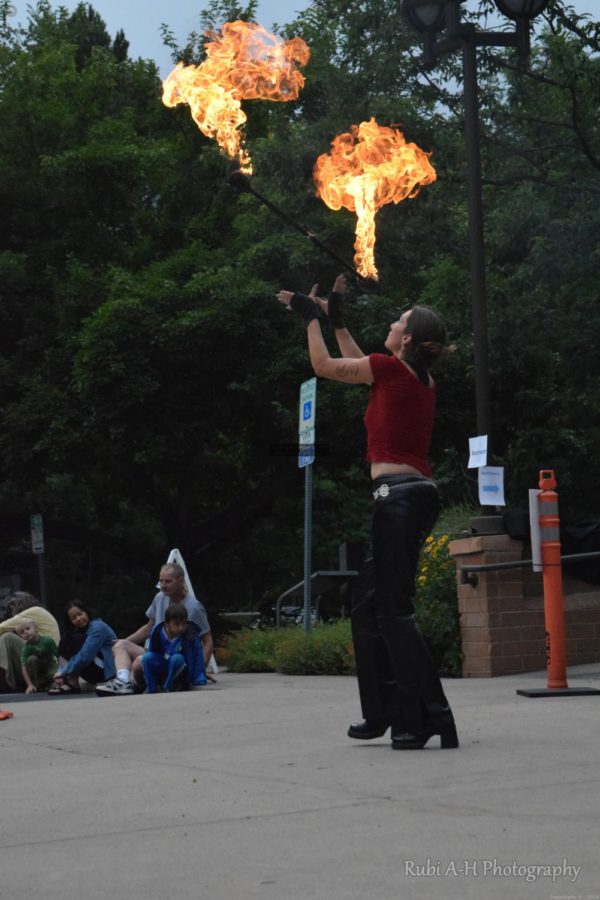 It takes lots of patience, concentration, and risk taking. Pictured here is fire dancer Michelle Hindman. 