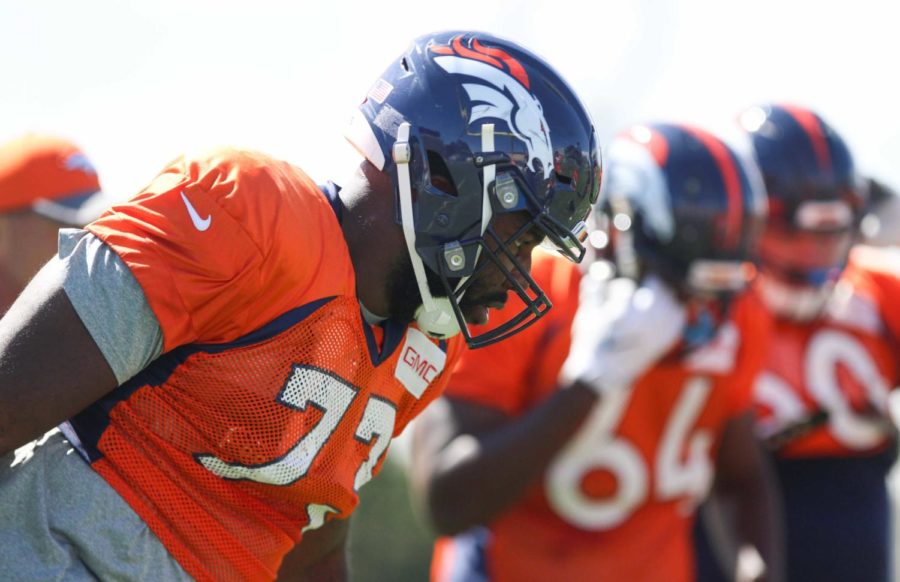 Russel+Okung+lines+up+at+Broncos+practice.