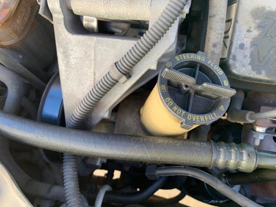 Another helpful thing to know is where to fill steering fluid. Steering fluid is what helps turn the tires with the steering wheel. To fill it, fluid is placed where steering fluid is marked. 