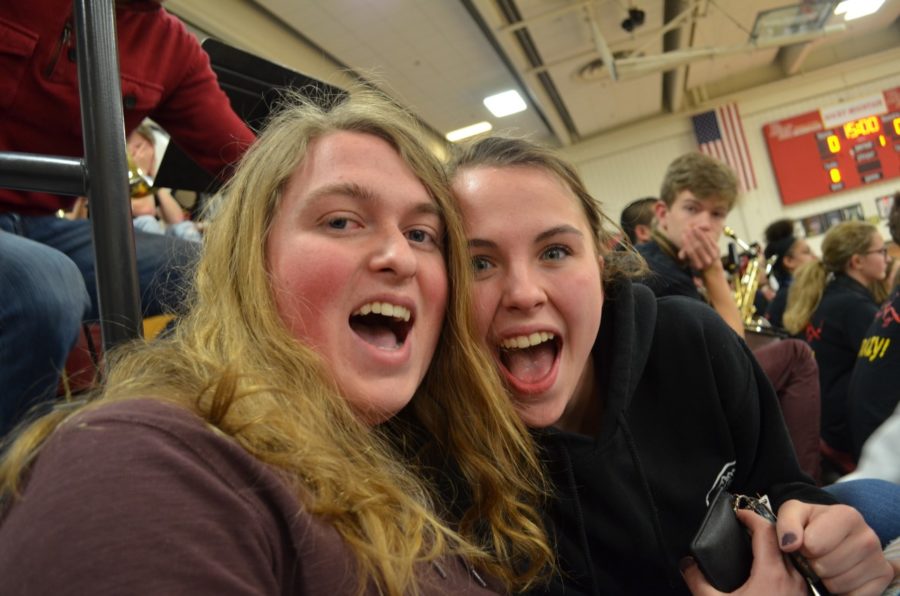 Garrit Wilson, junior, and Maggie Cronen-Smith, senior, are ecstatic for this nights game.