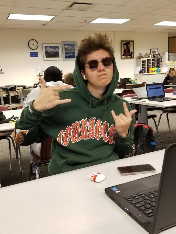Hunter+Siemer+shows+off+his+shades+while+in+class.