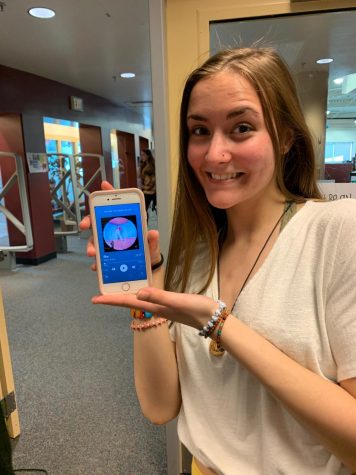 Raegan Marlow shows off one of her favorite albums.