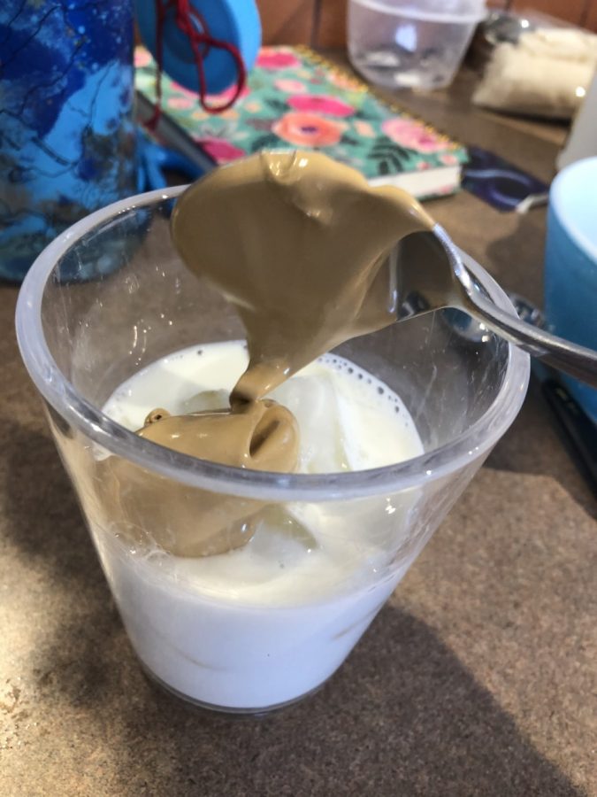 Whipped coffee served with milk and ice.