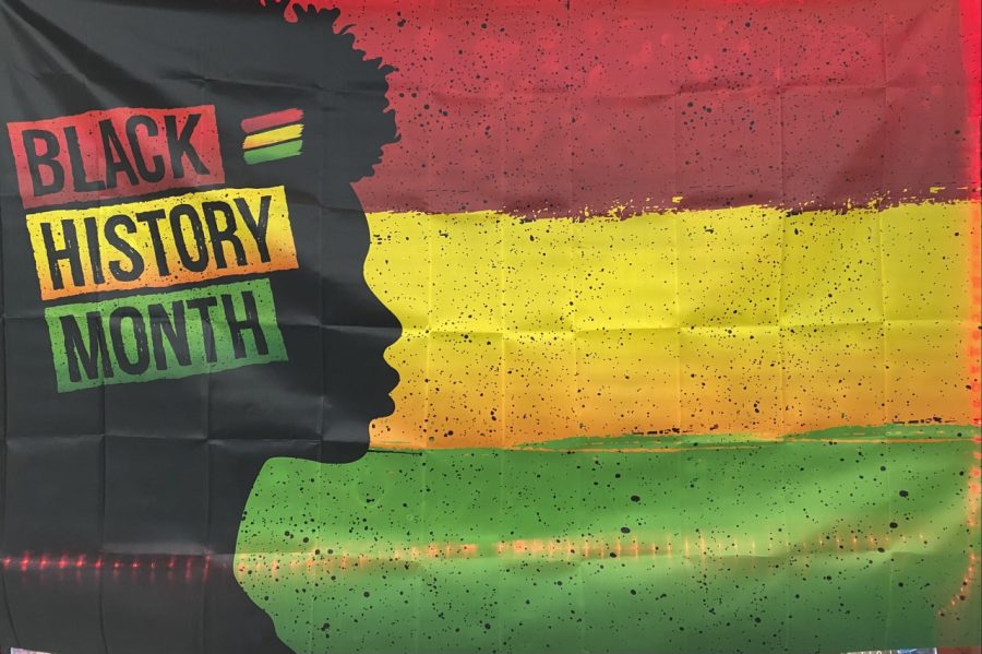 A+Black+History+Month+flag+hangs+in+the+Media+Center+to+recognize+Black+History+Month.