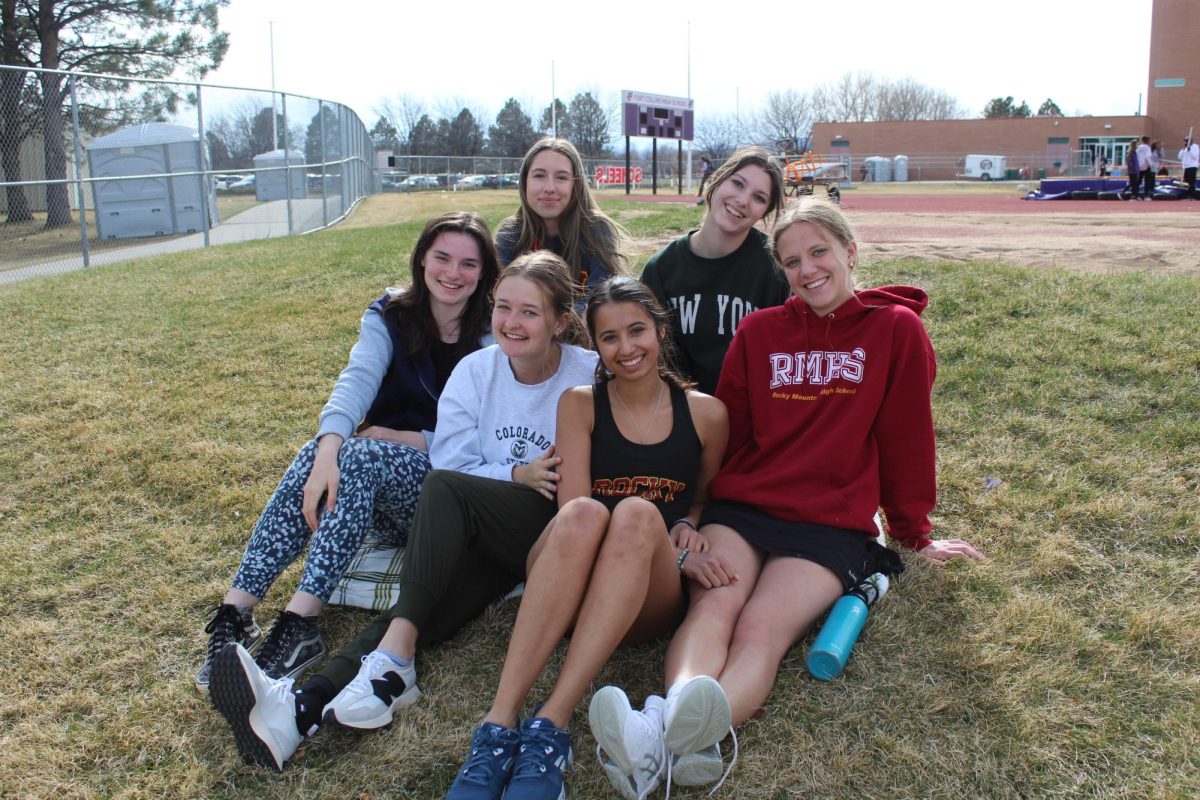 Teresa Collingwood, Izzy Poduska, Helen Flenner, Charlotte Glidewell-Devries, Neena Wittemyer, and Talia Didonato at Fort Collins High School for a crosstown rival match. 