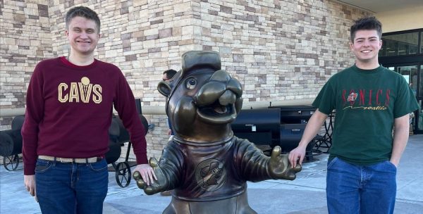 Edward Rinehart and Daniel Mitchell pose with Buc-ee at the Johnstown location of the gas station. 