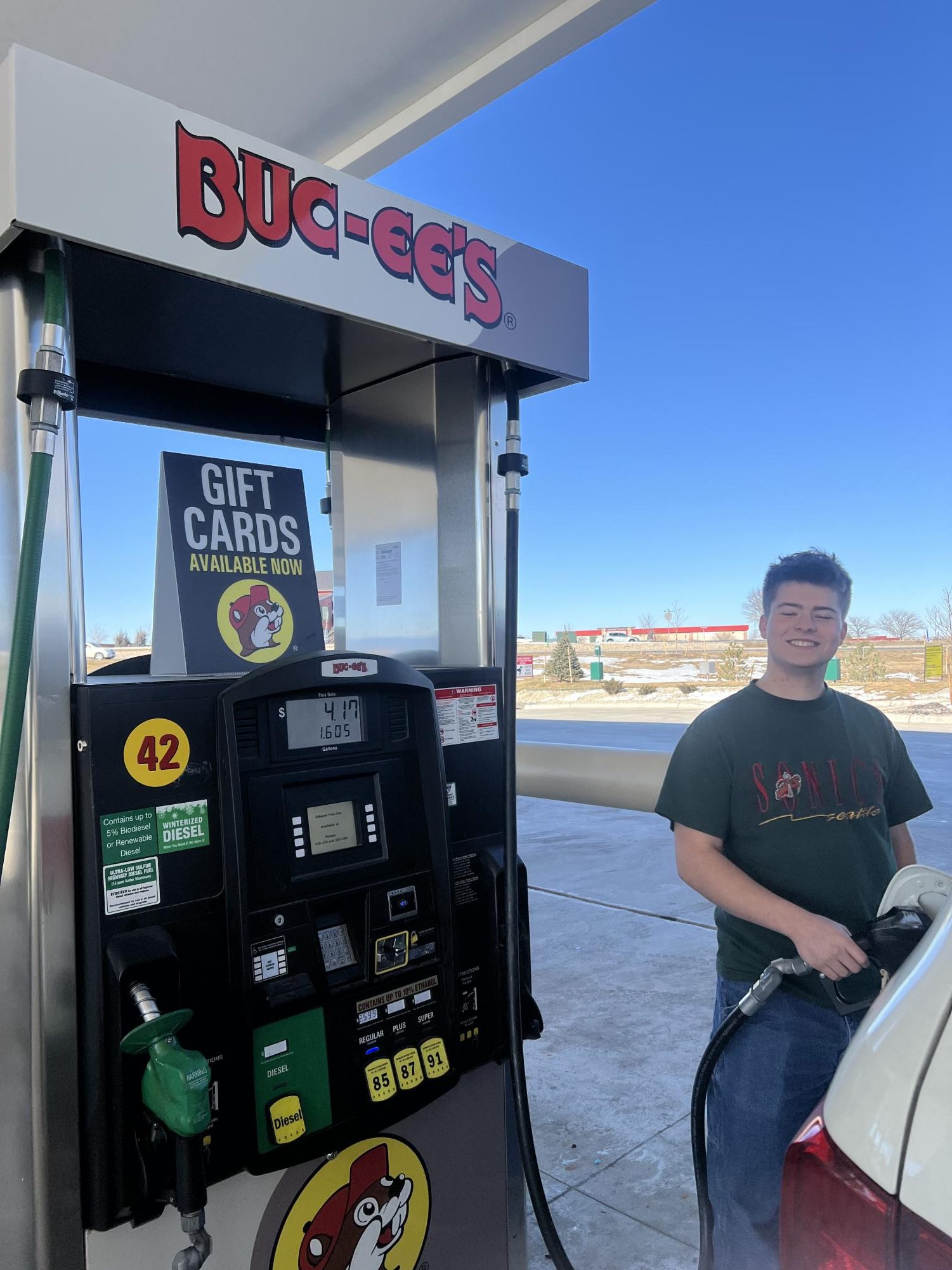 Edward Rinehart pumps gas at Buc-cee's