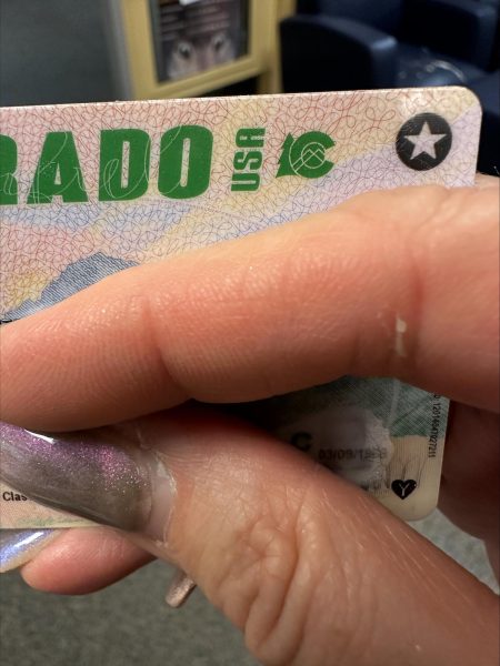 Colorado driver's licenses have had the REAL ID star in the corner since 2012. 