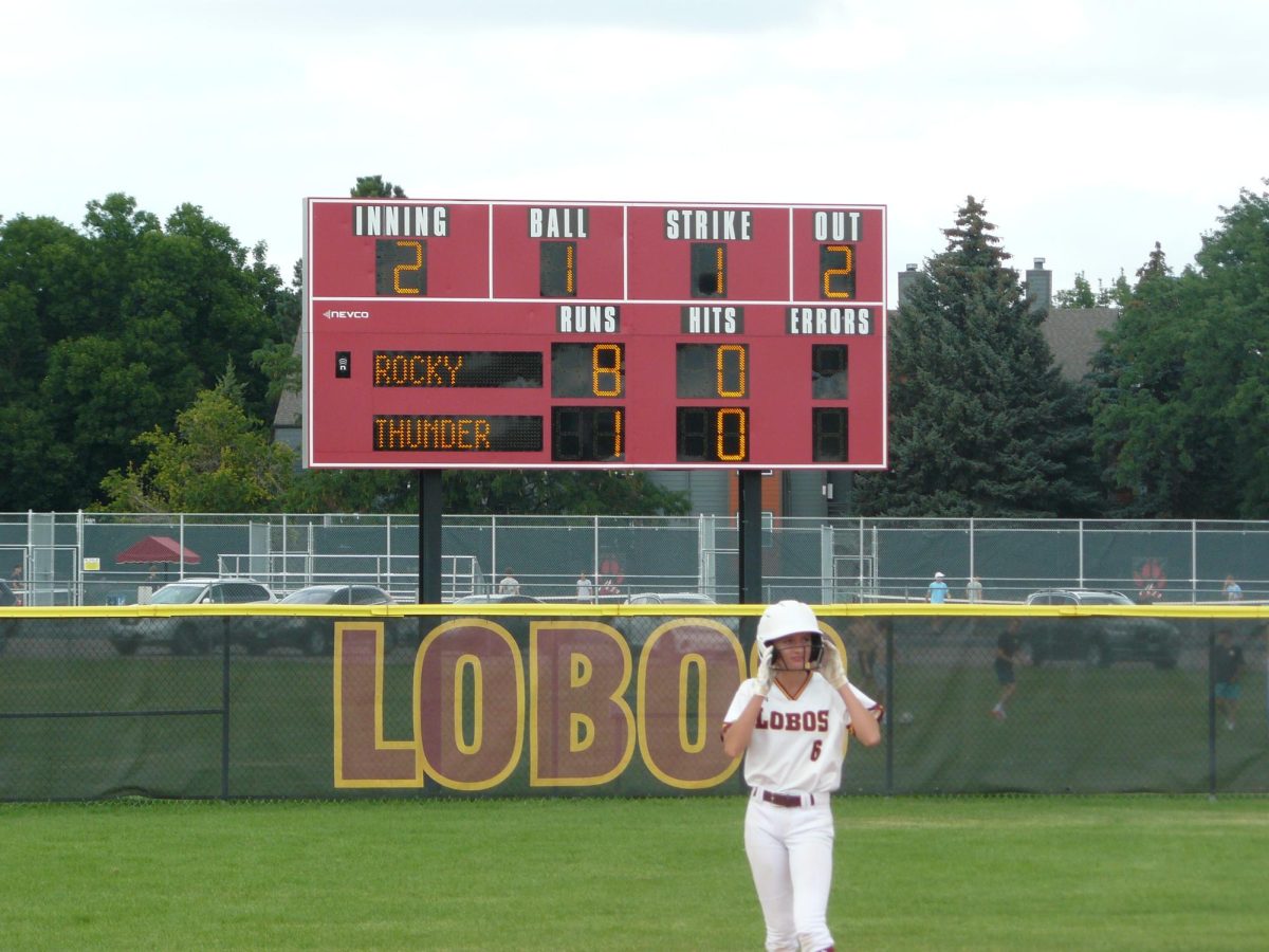 Berkley Bartels (sophomore) plays in-field second base for the varsity team in a game against Thunder Ridge. 