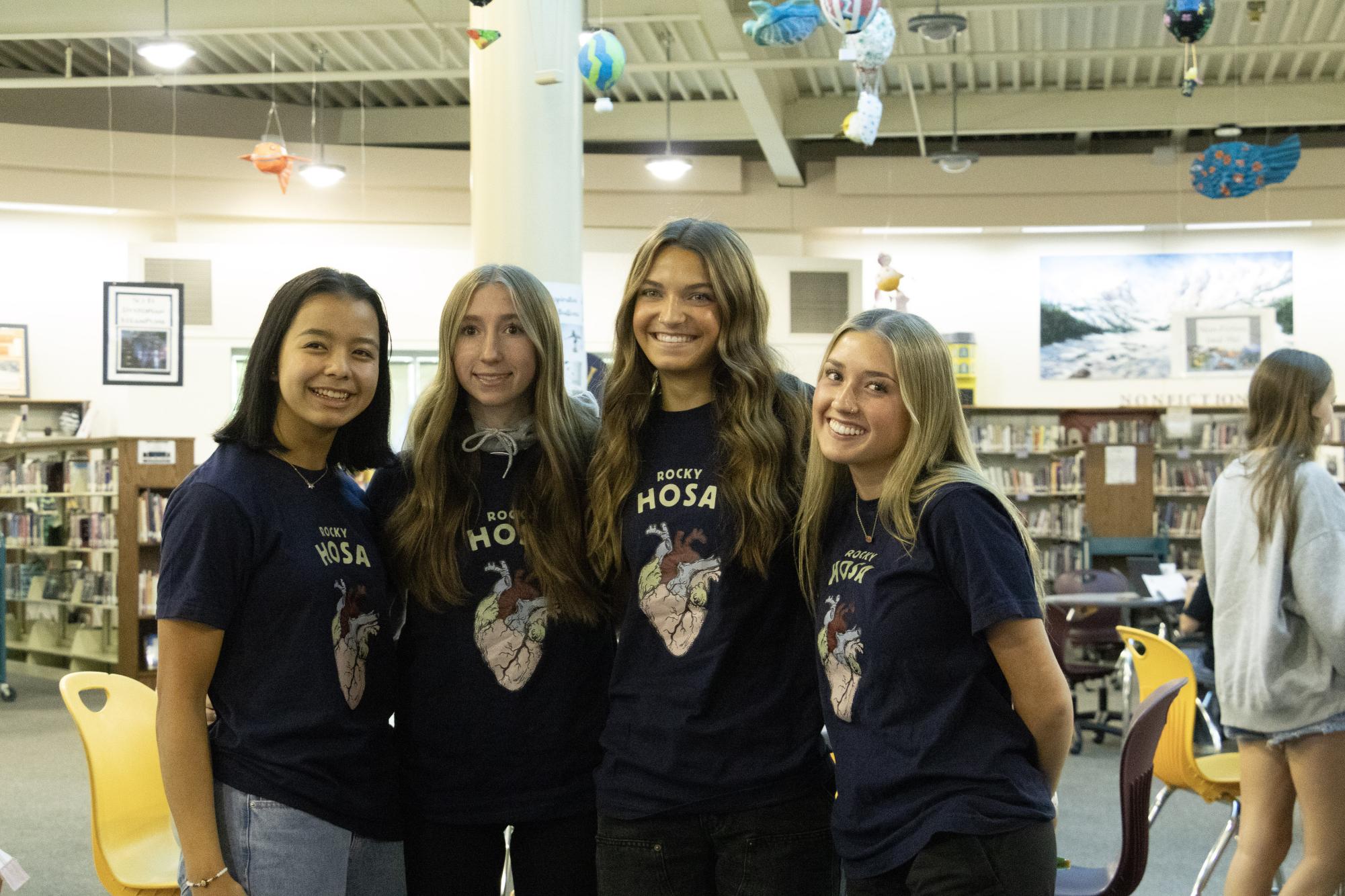 HOSA members Emma Praver, Gwen Grumbles, Emberlynn Saunders, and Annabelle Nordman help at the Blood Drive on September  19. 