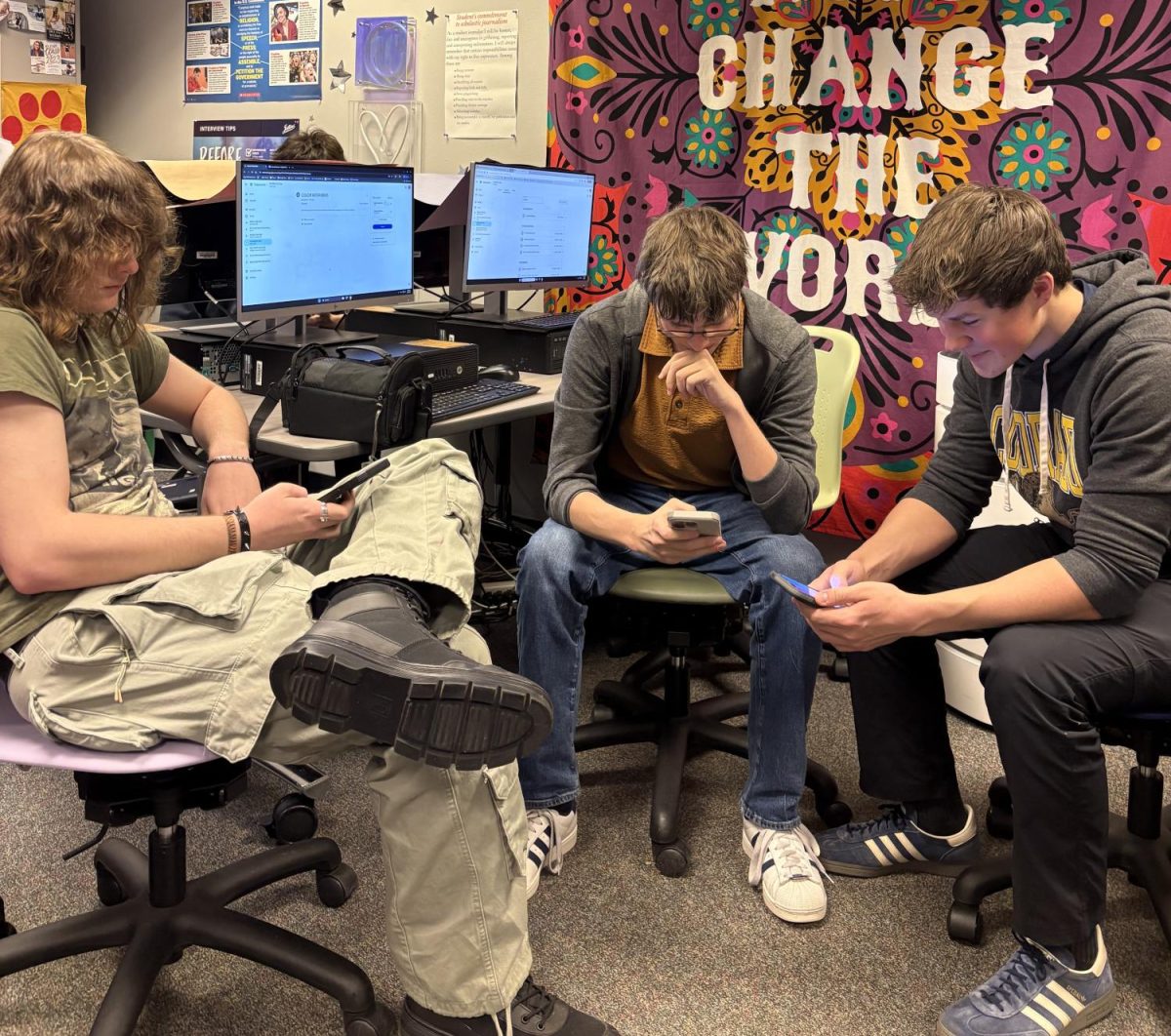 Students spend down time on their phones instead of talking and interacting with each other--phones have replaced boredom. 