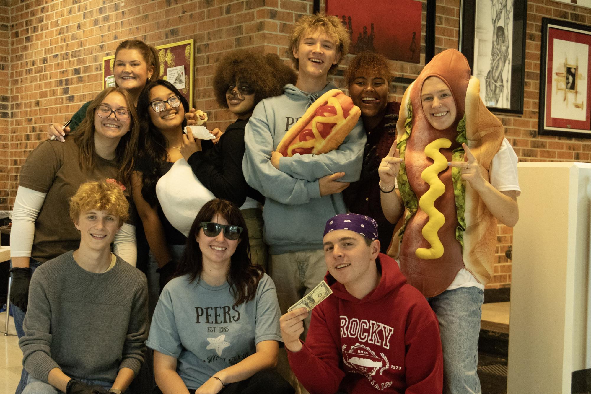 The Peers enjoy community the Weenie Roast.