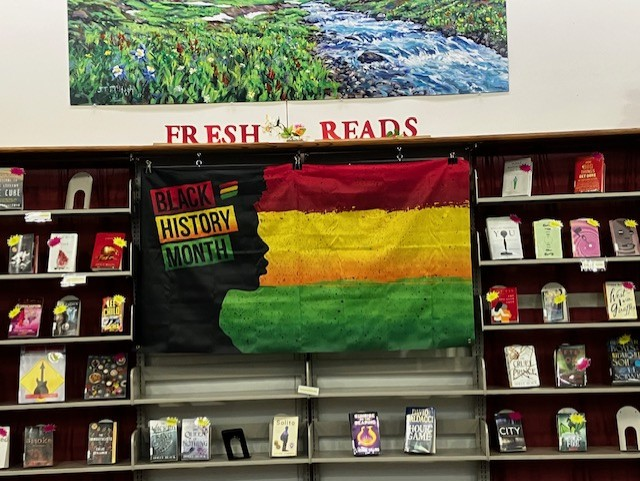 A Black History Month flag is set up in the Media Center to commemorate  100 years since the first celebration of African American week that ultimately turned into Black History Month in 1976. 


