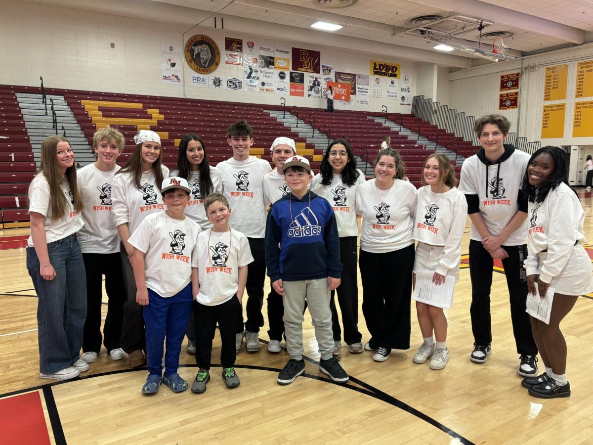 The Wish Committee stands with Gavin and his brothers after the Wish Assembly.