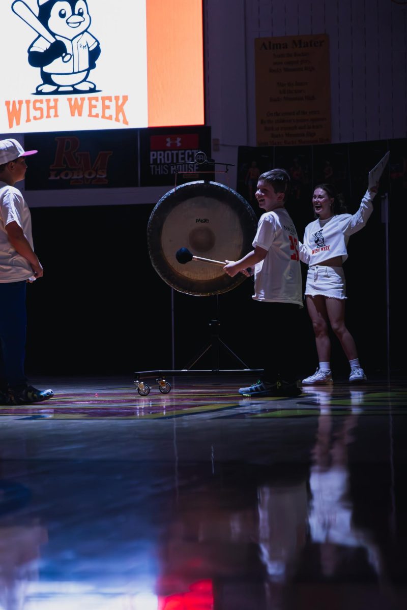 Gavin ends the assembly by hitting the tam-tam to celebrate finishing his chemotherapy.