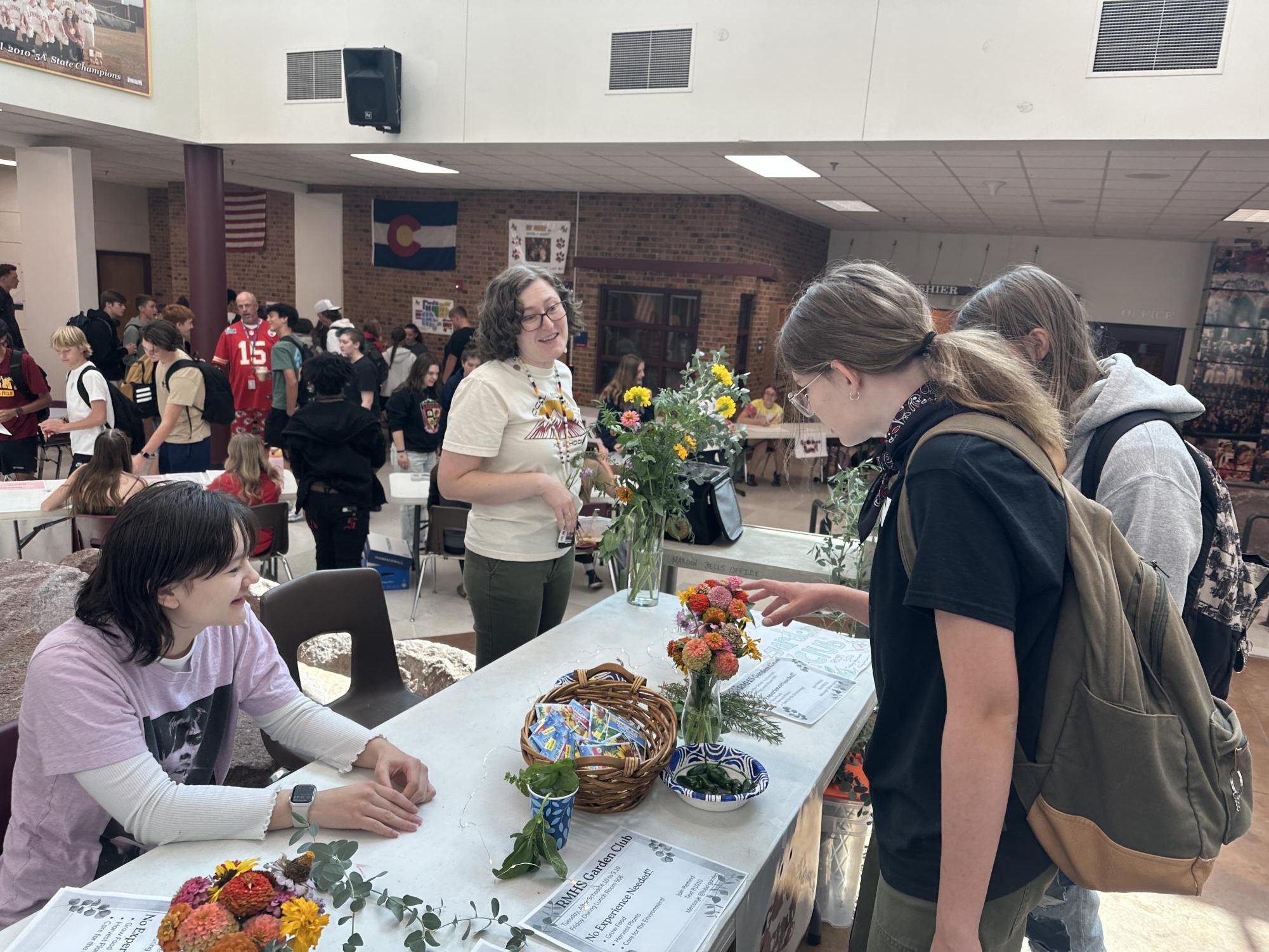 Students look at the Garden Club Club Rush table as they take in their options for school involvement. Rocky had so many clubs for students to join. 