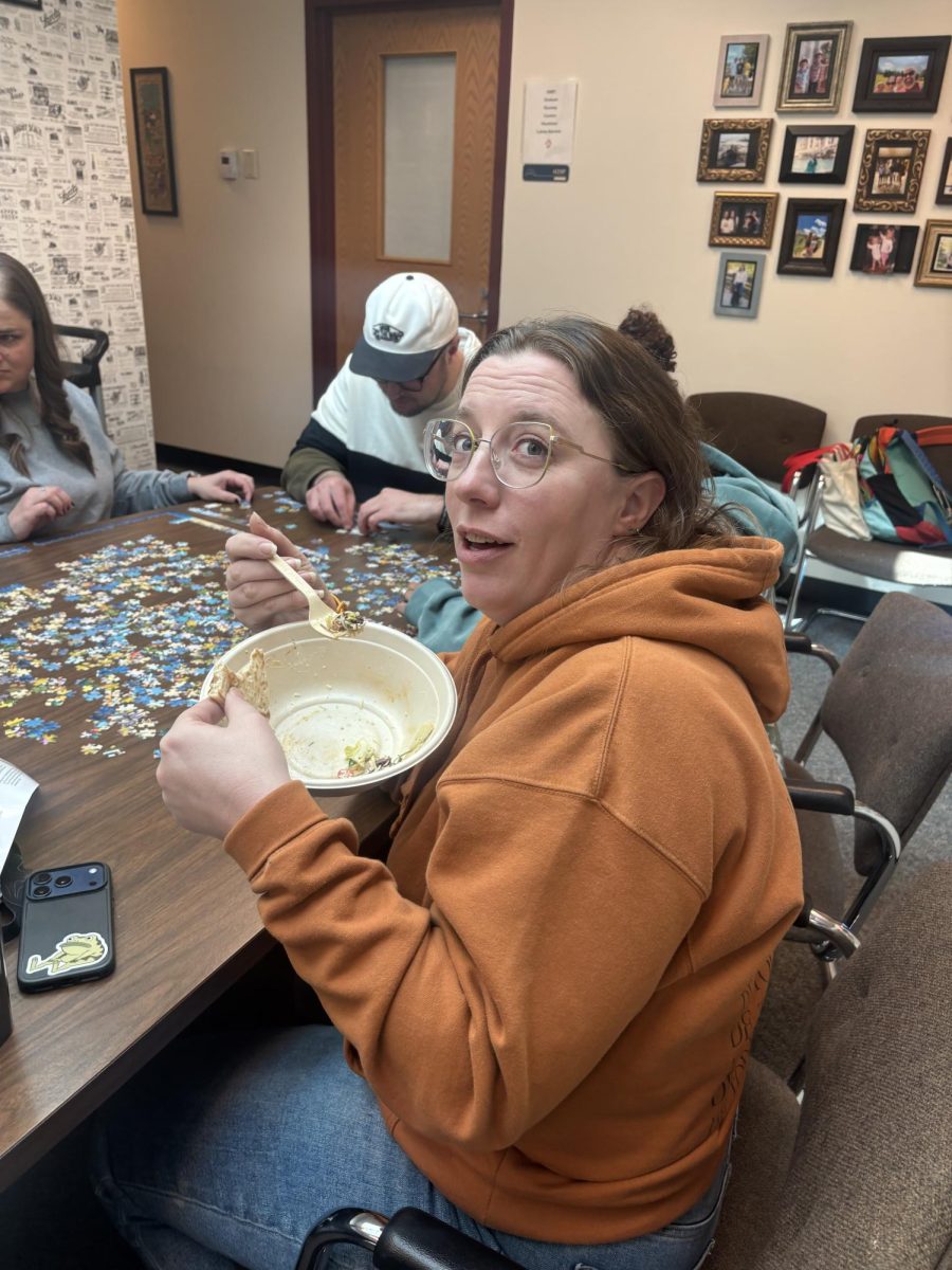 Ms. Rumley eats her lunch after she talked about her teaching story. 