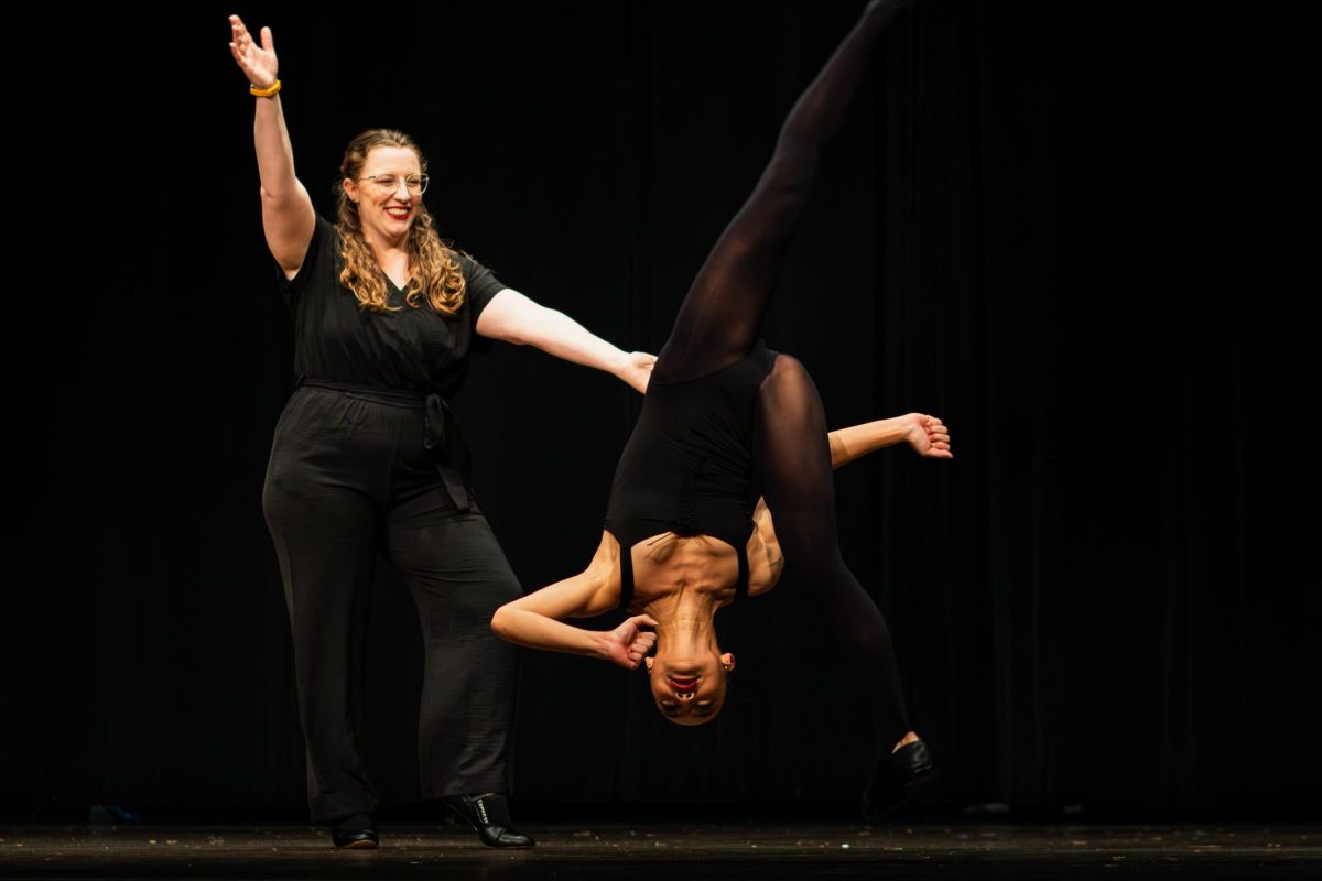 Ms. Bri Rumley and Sophia Imark perform a dance to show off their talent.