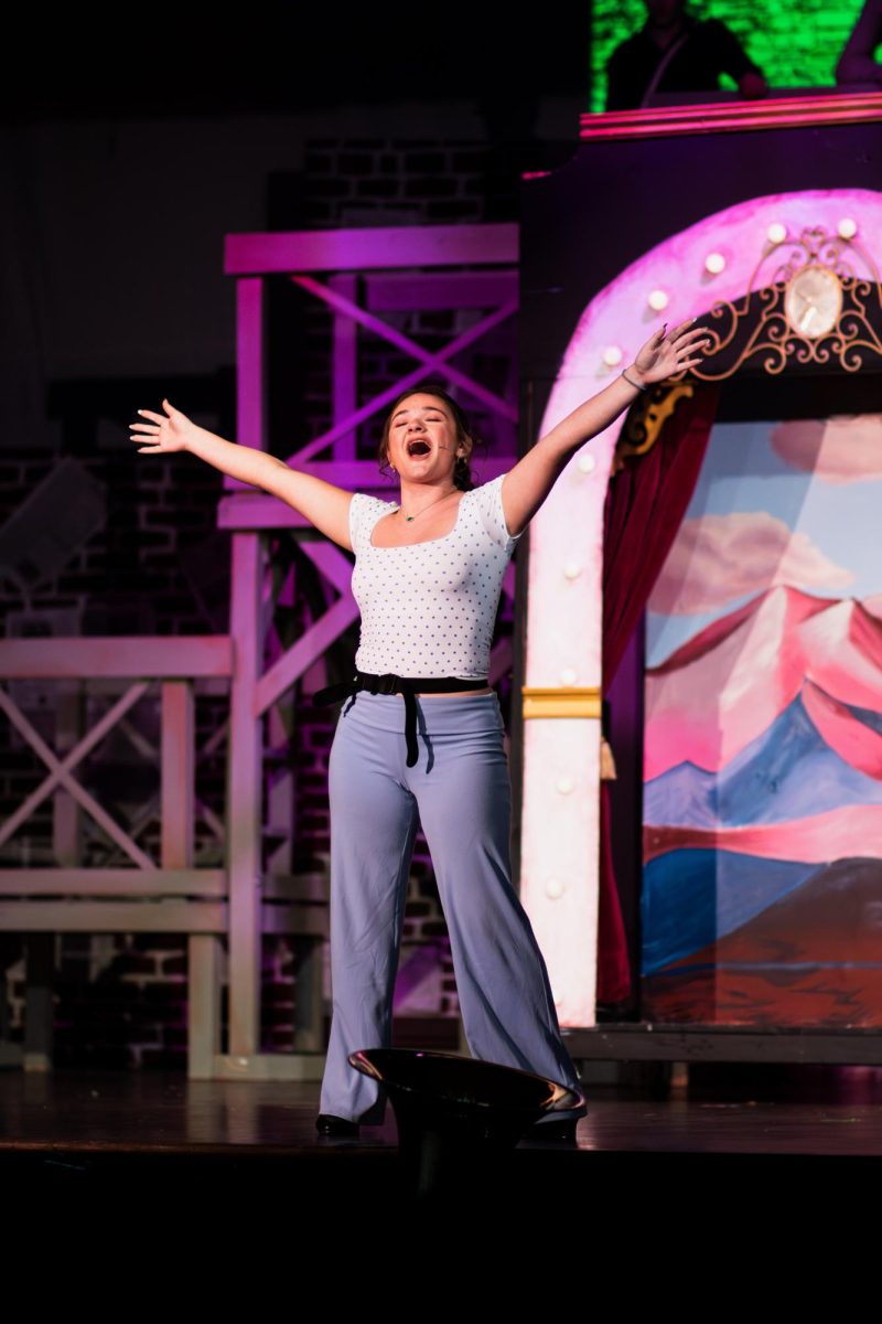 Senior Sophia Meyer performs a solo at an after school rehearsal for "Newsies."