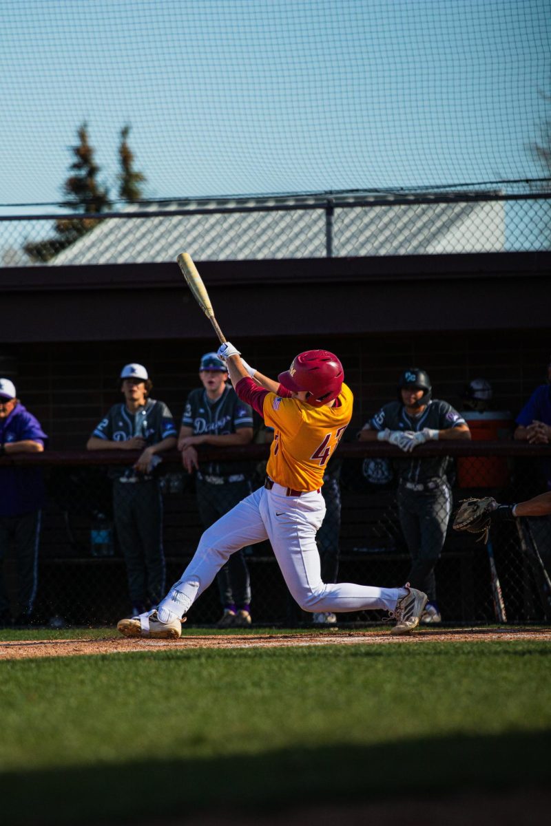 Junior Eli Murphy bats against Douglas County in April. 